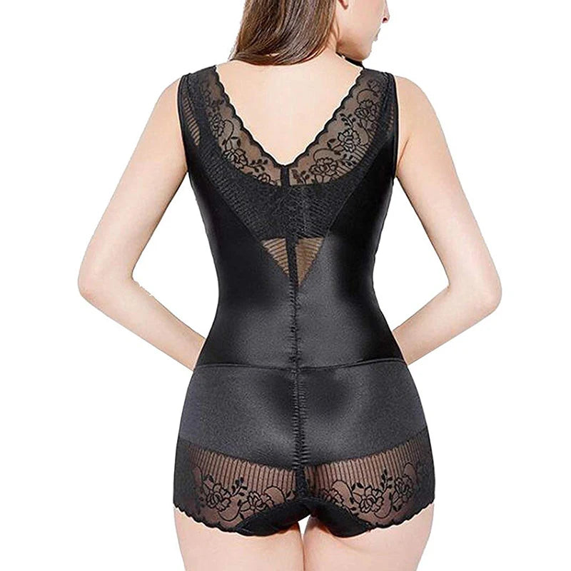 Woman wearing a black shapewear bodysuit against a white background