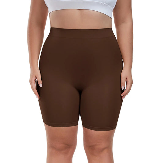 Brown shapewear shorts worn by a person on a white background