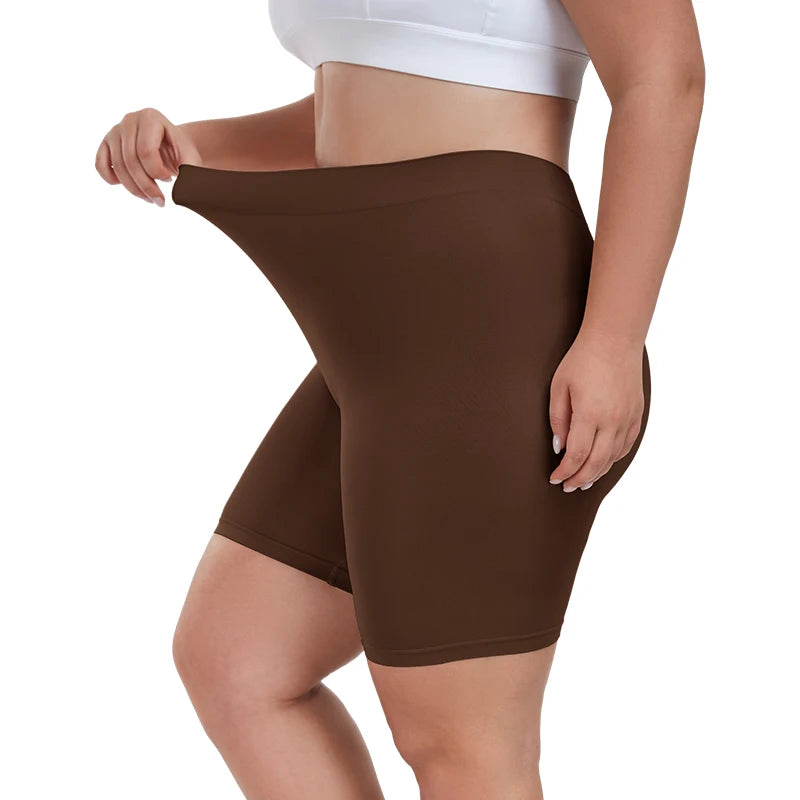 Brown shapewear shorts worn by a person on a white background