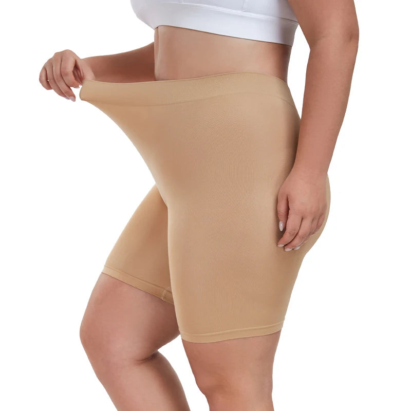 Beige shapewear shorts worn by a person on a white background
