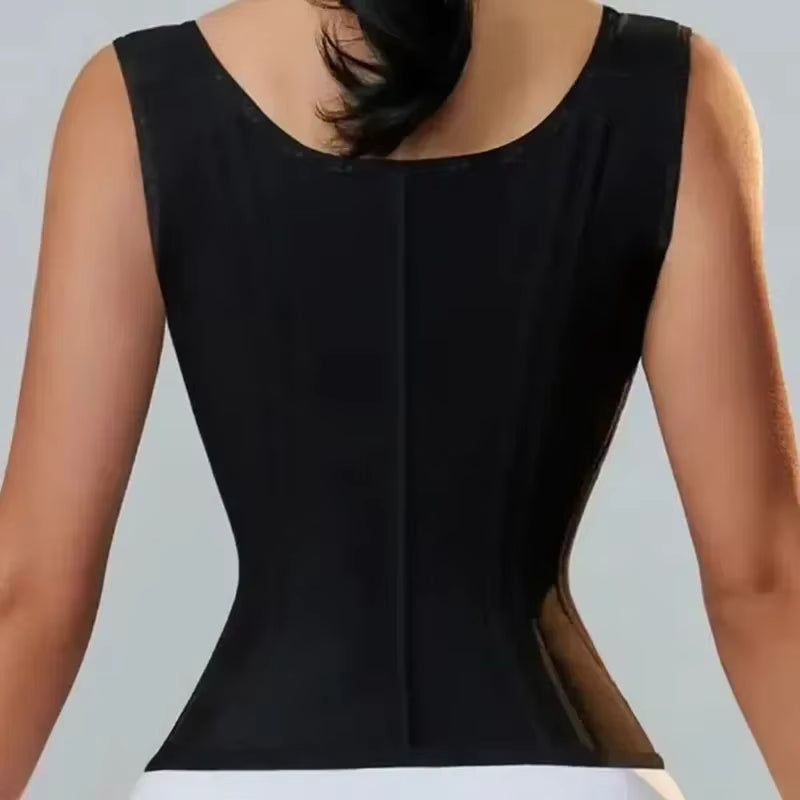 Black compression garment worn by a person on a gray background