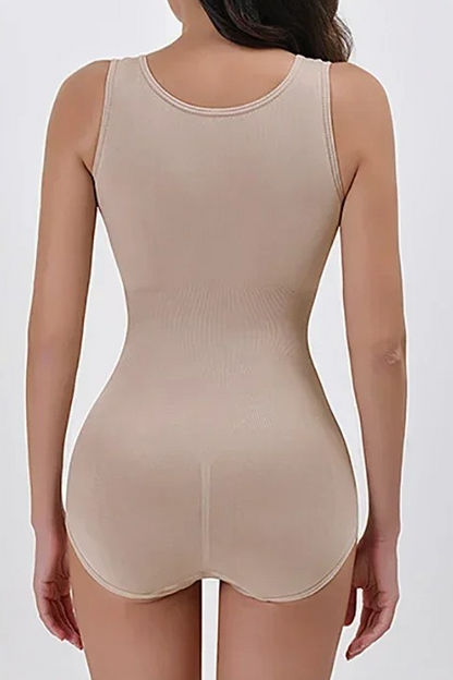 Beige shapewear bodysuit worn by a person on a white background