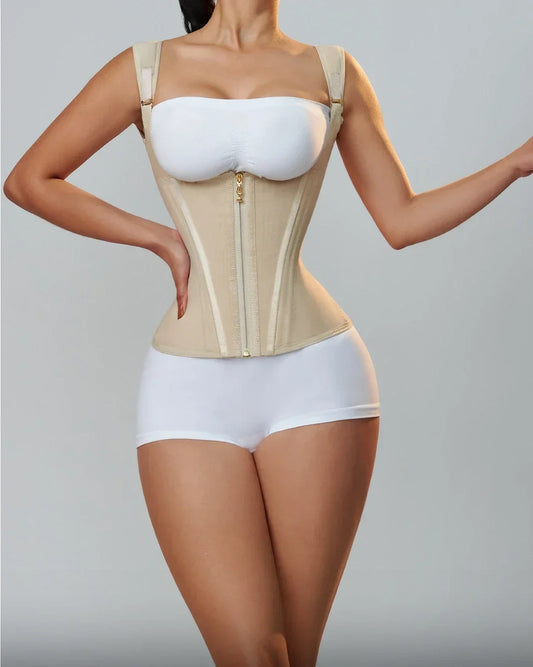 Woman wearing a beige body shaper against a gray background