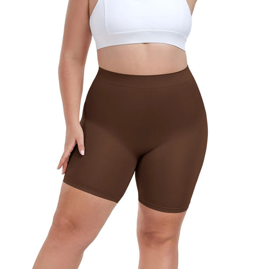 Brown shapewear shorts worn by a person on a white background